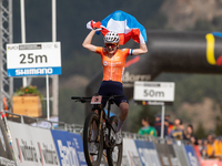 Puck Pieterse of Nederland crosses the finish line in the UCI Mountain Bike World Championships Women in Pal Arinsal, Andorra, on September...