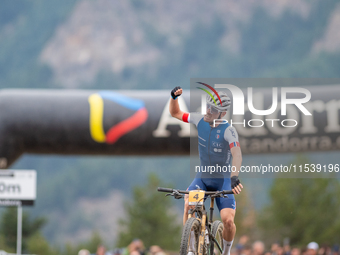 Luca Martin of France crosses the finish line in the UCI Mountain Bike World Championships Men Under 23 Race in Pal Arinsal, Andorra, on Sep...