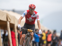 Luke Wiedmann of Switzerland participates in the UCI Mountain Bike World Championships Men Under 23 Race in Pal Arinsal, Andorra, on Septemb...