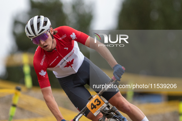 Ian Ackert of Canada competes in the UCI Mountain Bike World Championships Men Under 23 Race in Pal Arinsal, Andorra, on September 1, 2024. 