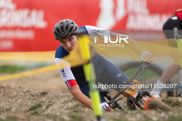 Mathis Guay of France competes in the UCI Mountain Bike World Championships Men Under 23 Race in Pal Arinsal, Andorra, on September 1, 2024....