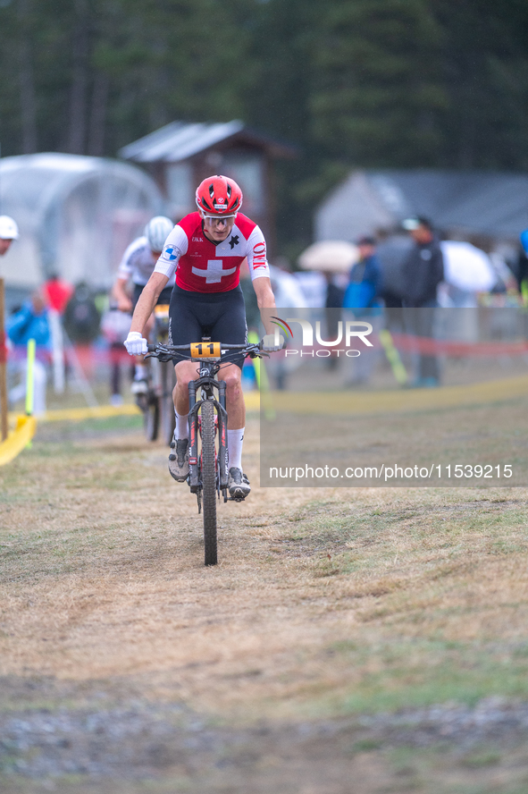 Luke Wiedmann of Switzerland participates in the UCI Mountain Bike World Championships Men Under 23 Race in Pal Arinsal, Andorra, on Septemb...