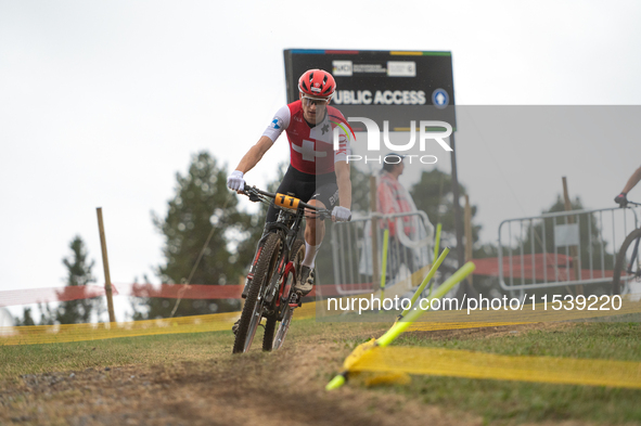 Luke Wiedmann of Switzerland participates in the UCI Mountain Bike World Championships Men Under 23 Race in Pal Arinsal, Andorra, on Septemb...