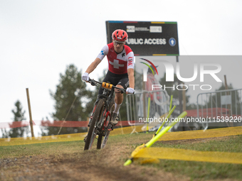 Luke Wiedmann of Switzerland participates in the UCI Mountain Bike World Championships Men Under 23 Race in Pal Arinsal, Andorra, on Septemb...