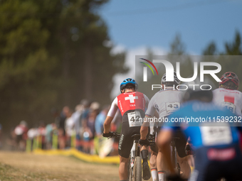 A cyclist participates in the UCI Mountain Bike World Championships Men in Pal Arinsal, Andorra, on September 1, 2024. (