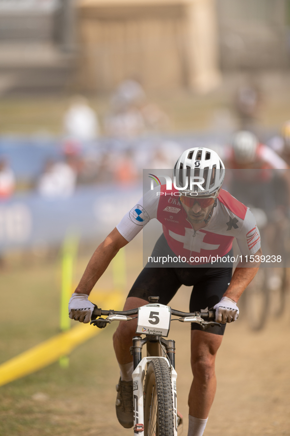 Nino Schurter of Switzerland participates in the UCI Mountain Bike World Championships Men in Pal Arinsal, Andorra, on September 1, 2024. 