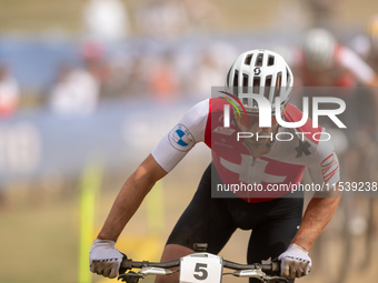 Nino Schurter of Switzerland participates in the UCI Mountain Bike World Championships Men in Pal Arinsal, Andorra, on September 1, 2024. (