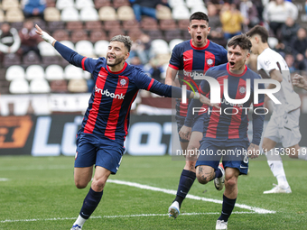 Ivan Leguizamon of San Lorenzo celebrates with his teammates after scoring the first goal of his team during a match between Platense and Sa...