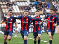 Ivan Leguizamon of San Lorenzo celebrates with his teammates after scoring the first goal of his team during a match between Platense and Sa...