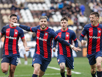 Ivan Leguizamon of San Lorenzo celebrates with his teammates after scoring the first goal of his team during a match between Platense and Sa...