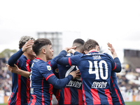 Ivan Leguizamon of San Lorenzo celebrates with his teammates after scoring the first goal of his team during a match between Platense and Sa...