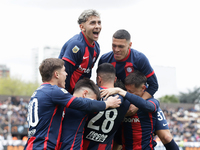 Ivan Leguizamon of San Lorenzo celebrates with his teammates after scoring the first goal of his team during a match between Platense and Sa...