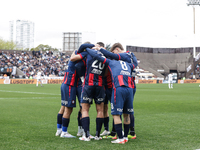 Ivan Leguizamon of San Lorenzo celebrates with his teammates after scoring the first goal of his team during a match between Platense and Sa...