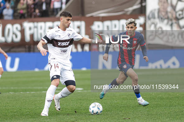 Leonel Picco of Platense and Elian Irala of San Lorenzo are in action during the match between Platense and San Lorenzo as part of Liga Prof...