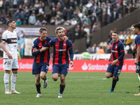 Elian Irala of San Lorenzo celebrates with his teammates after scoring the second goal of his team during a match between Platense and San L...