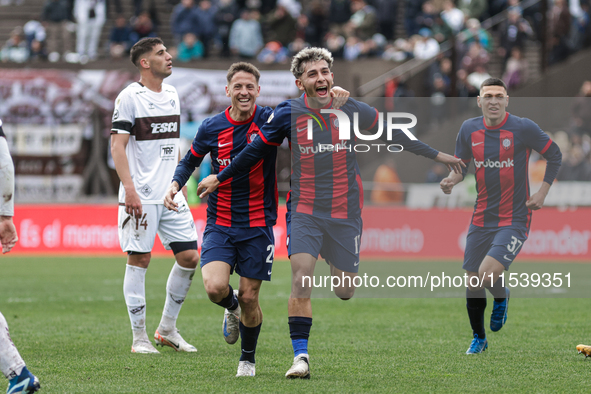 Elian Irala of San Lorenzo celebrates with his teammates after scoring the second goal of his team during a match between Platense and San L...