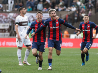 Elian Irala of San Lorenzo celebrates with his teammates after scoring the second goal of his team during a match between Platense and San L...