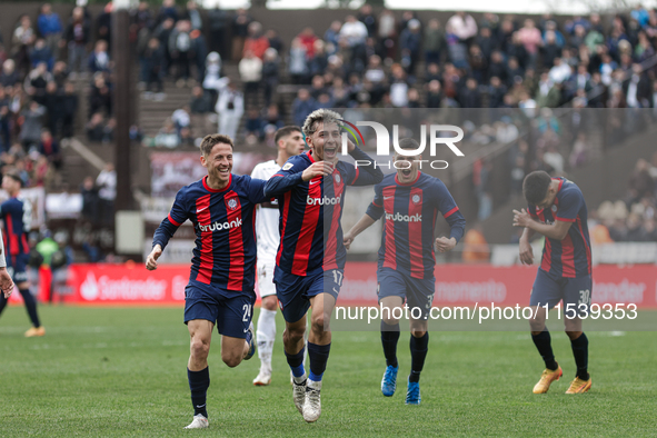 Elian Irala of San Lorenzo celebrates with his teammates after scoring the second goal of his team during a match between Platense and San L...