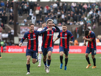 Elian Irala of San Lorenzo celebrates with his teammates after scoring the second goal of his team during a match between Platense and San L...