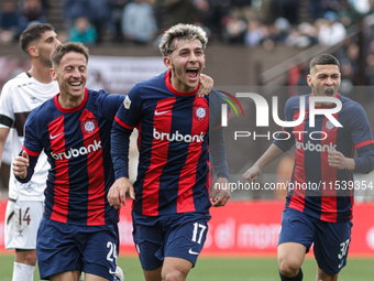 Elian Irala of San Lorenzo celebrates with his teammates after scoring the second goal of his team during a match between Platense and San L...