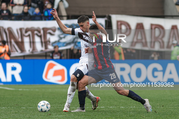 Alexis Cuello of San Lorenzo and Leonel Picco of Platense are in action during the match between Platense and San Lorenzo as part of Liga Pr...