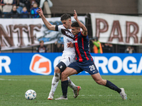 Alexis Cuello of San Lorenzo and Leonel Picco of Platense are in action during the match between Platense and San Lorenzo as part of Liga Pr...