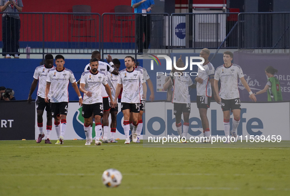 FC Dallas players celebrate after Logan Farrington scores a goal during the MLS match between FC Dallas and Colorado Rapids at Toyota Stadiu...