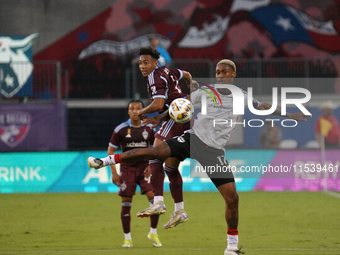 FC Dallas defender Nkosi Tafari #17 battles for the ball with Jonathan Lewis #7 of Colorado Rapids during the MLS match between FC Dallas an...