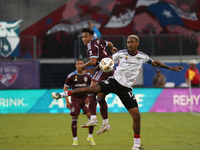 FC Dallas defender Nkosi Tafari #17 battles for the ball with Jonathan Lewis #7 of Colorado Rapids during the MLS match between FC Dallas an...