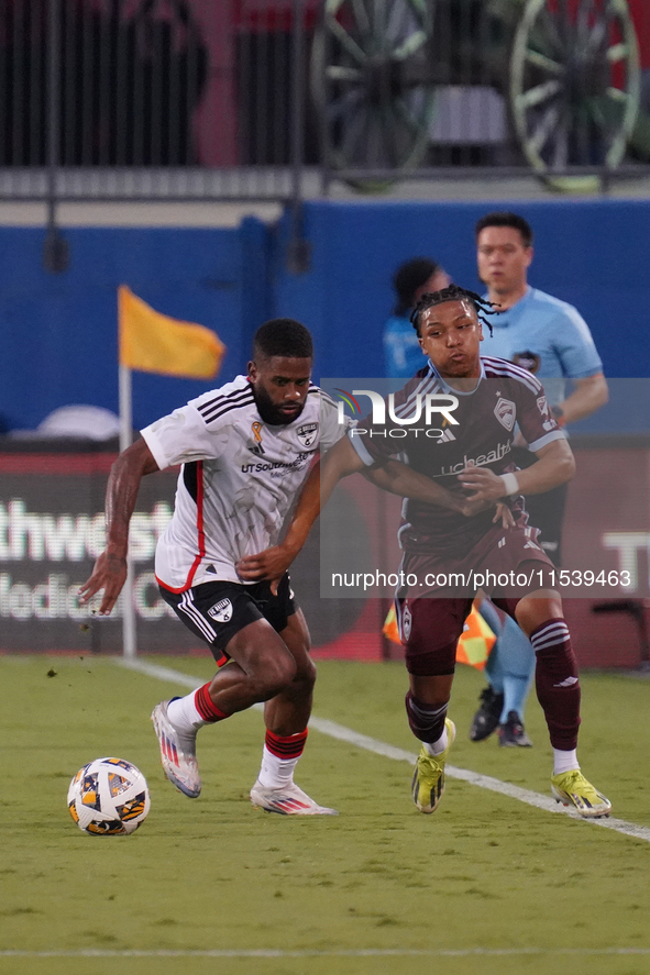 FC Dallas midfielder Ruan Gregorio Teixeira #5 and Colorado Rapids defender Jackson Travis #99 battle for the ball during the MLS match betw...