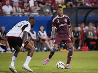 Colorado Rapids midfielder Calvin Harris #14 drives the ball during the MLS match between FC Dallas and Colorado Rapids at Toyota Stadium in...