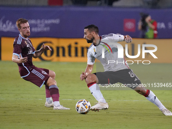 FC Dallas forward Sebastian Lletget #8 drives the ball against Connor Ronan #20 of Colorado Rapids during the MLS match between FC Dallas an...