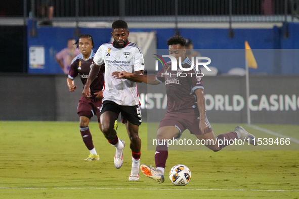 Colorado Rapids forward Jonathan Lewis #7 and Ruan Gregorio Teixeira #5 of FC Dallas battle for the ball during the MLS match between FC Dal...