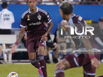 Colorado Rapids midfielder Calvin Harris #14 controls the ball during the MLS match between FC Dallas and Colorado Rapids at Toyota Stadium...