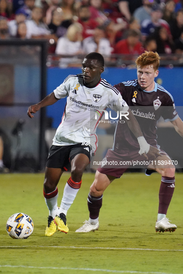 FC Dallas forward Katlego Ntsabeleng #16 is marked by Colorado Rapids' Oliver Larraz #18 during the MLS match between FC Dallas and Colorado...