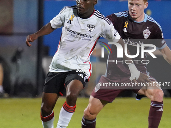 FC Dallas forward Katlego Ntsabeleng #16 is marked by Colorado Rapids' Oliver Larraz #18 during the MLS match between FC Dallas and Colorado...