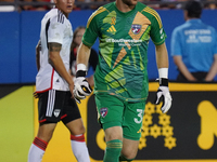 FC Dallas goalkeeper Maarten Paes #30 controls the ball during the MLS match between FC Dallas and Colorado Rapids at Toyota Stadium in Fris...