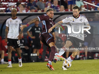 FC Dallas midfielder Asier Illarramendi #14 and Colorado Rapids forward Rafael Navarro #9 battle for the ball during the MLS match between F...