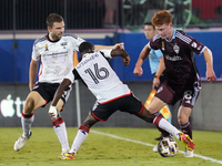 FC Dallas player Katlego Ntsabeleng #16 and Colorado Rapids midfielder Oliver Larraz #18 battle for the ball during the MLS match between FC...