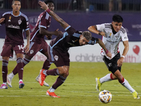 FC Dallas defender Marco Farfan #4 and Colorado Rapids forward Rafael Navarro #9 battle for the ball during the MLS match between FC Dallas...