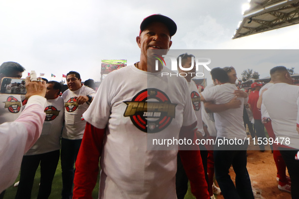 Lorenzo Bundy, #30 manager of Diablos Rojos, celebrates after winning the South Zone 2024 championship series of the Mexican Baseball League...