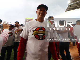 Lorenzo Bundy, #30 manager of Diablos Rojos, celebrates after winning the South Zone 2024 championship series of the Mexican Baseball League...