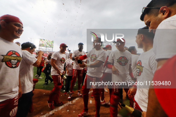 Diablos Rojos players celebrate winning the South Zone 2024 championship series of the Mexican Baseball League (LMB) against Guerreros de Oa...