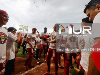 Diablos Rojos players celebrate winning the South Zone 2024 championship series of the Mexican Baseball League (LMB) against Guerreros de Oa...