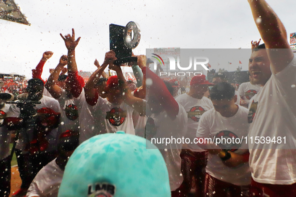 Diablos Rojos players celebrate winning the South Zone 2024 championship series of the Mexican Baseball League (LMB) against Guerreros de Oa...