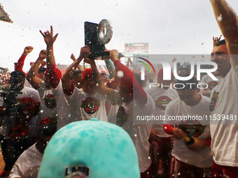 Diablos Rojos players celebrate winning the South Zone 2024 championship series of the Mexican Baseball League (LMB) against Guerreros de Oa...