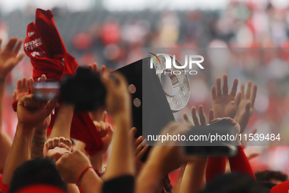 Diablos Rojos players celebrate winning the South Zone 2024 championship series of the Mexican Baseball League (LMB) against Guerreros de Oa...