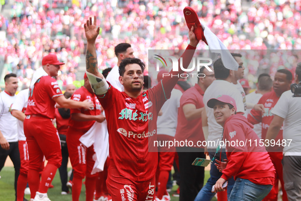 Juan Carlos Gamboa #47 of Diablos Rojos celebrates at the end of match 7 of the Mexican Baseball League (LMB) South Zone 2024 championship s...