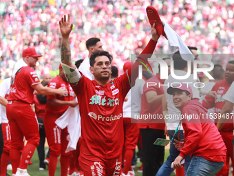 Juan Carlos Gamboa #47 of Diablos Rojos celebrates at the end of match 7 of the Mexican Baseball League (LMB) South Zone 2024 championship s...