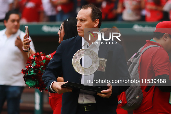 Horacio de la Vega, president of LMB, delivers the trophy of Champion South Zone of the Mexican Baseball League (LMB) to Diablos Rojos at th...